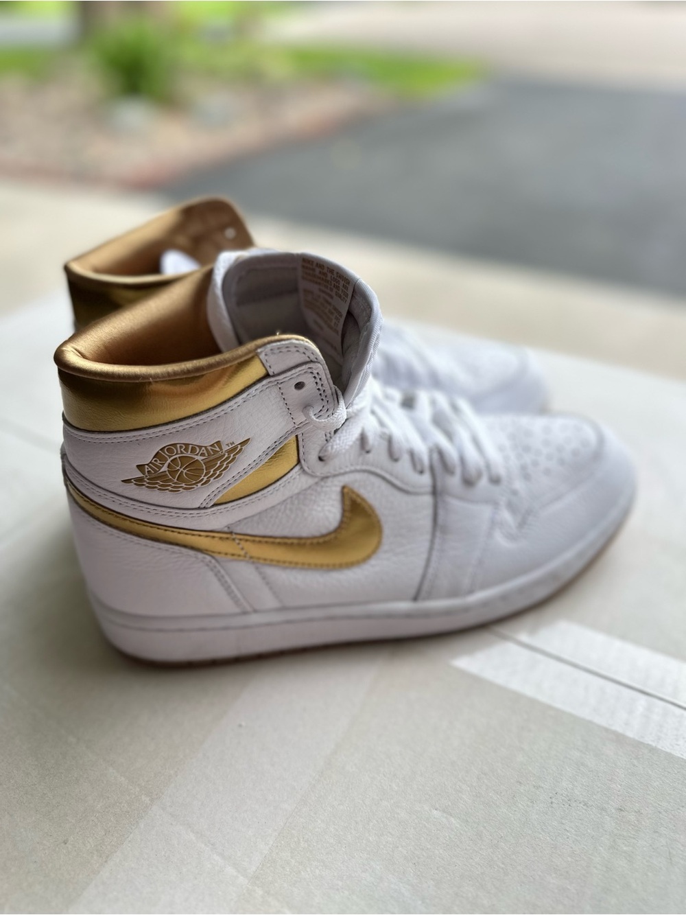 Jordan Women’s High-Top Sneakers — White/Metallic Gold